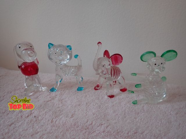 Lot 59-43429 - 4 Vintage Clear Plastic Christmas Figurines