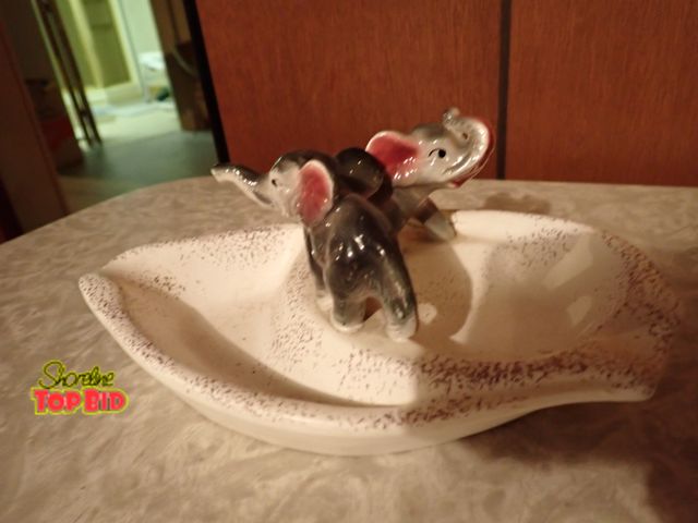 Lot 59-43334 - Mid-Century Ashtray with Elephants 7 1/2" long