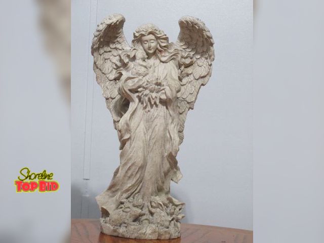 Lot 59-10074 - 19 1/2"T resin angel holding a rabbit, 2 more rabbits at her feet, good condition.