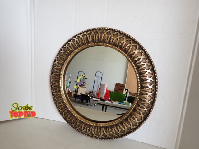 Lot 59-20031 - A great mirror to compliment any room, 17 1/2" diameter (frame). The mirror os a 12" diameter. Resem...