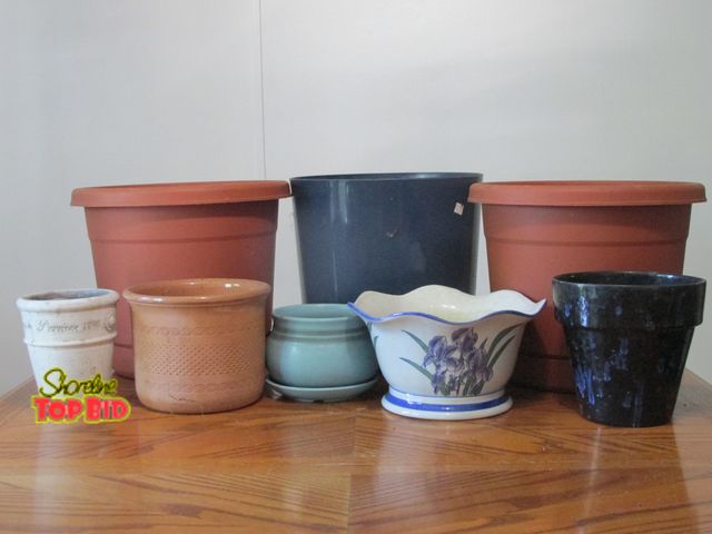 Lot 59-10086 - Lot of 8 planters, 3 are very large, plain in appearance but sturdy.  Some of the other five medium ...
