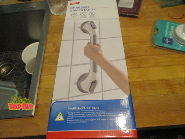 Lot 59-92010 - four safety grab bars with suction cups. 3 new, 1 used, i have 1 in shower works great.