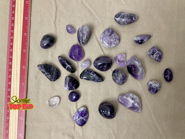 Lot 59-83049 - Beautiful lot of polished amethyst rocks.