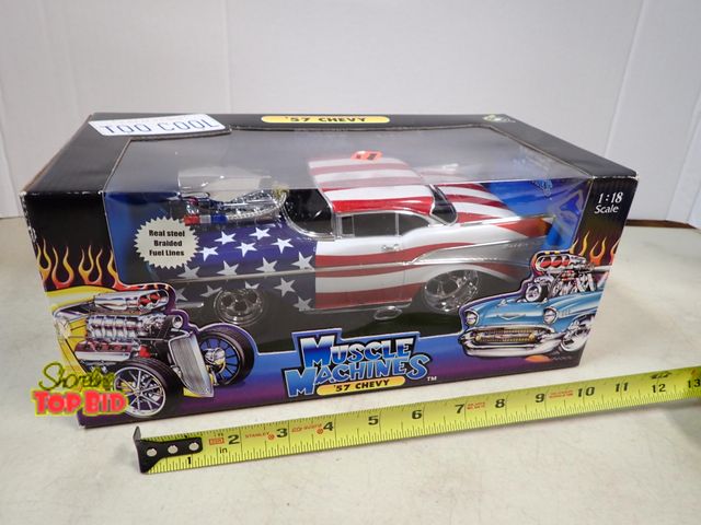 Lot 59-41191 - New 1957 Chevy 1:18 Scale Muscle Machines Diecast American Flag Painted Roadster