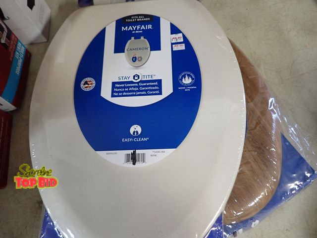 Lot 59-21211 - 1 White Toilet Seat and 1 Brown Toilet Seat. Benefits YMCA Camp Pendalouan