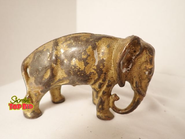 Lot 59-21002 - Original Cast Iron Arcade Small Elephant Bank. circa 1910, Est. Value $50 to $450, 3" x 4" x 1 3/4"