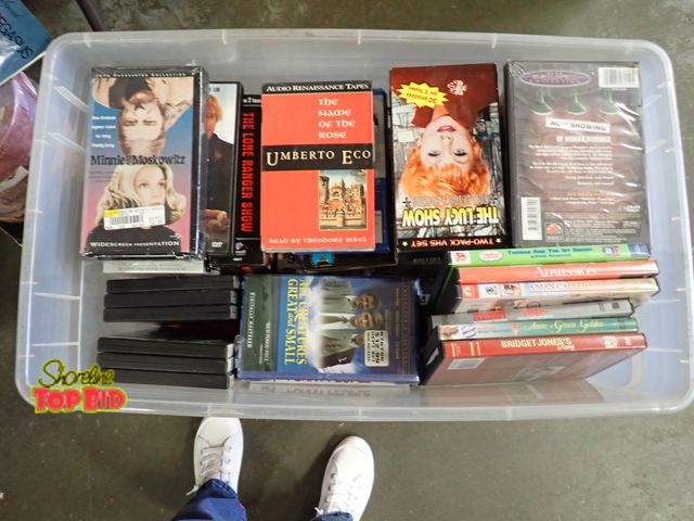 Lot 59-58151 - Tub Full of VHS Tapes and DVDs, Unsearched
