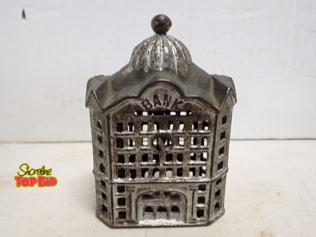 Lot 59-14263 - Ca. 1900, Cast Iron Domed Top Building Still Bank by A.C. Williams, 5" tall x 3" wide x 2" deep. Est...