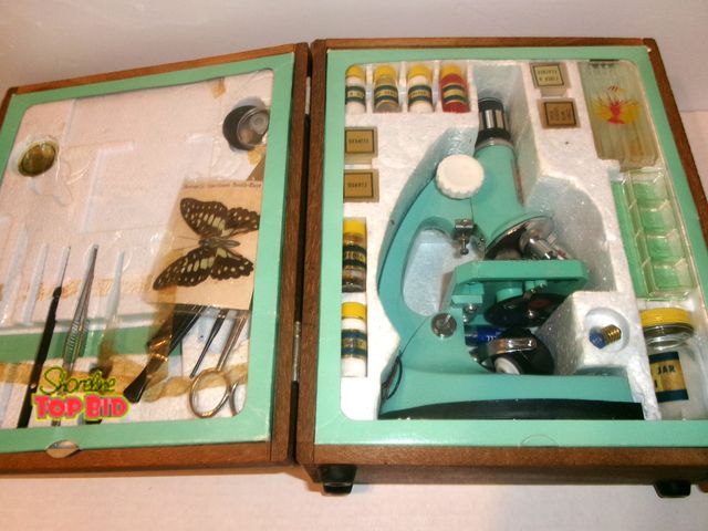 Lot 59-74485 - Vintage Tasco Deluxe High Quality Microscope - never played with still has wrap on inside - wood cas...