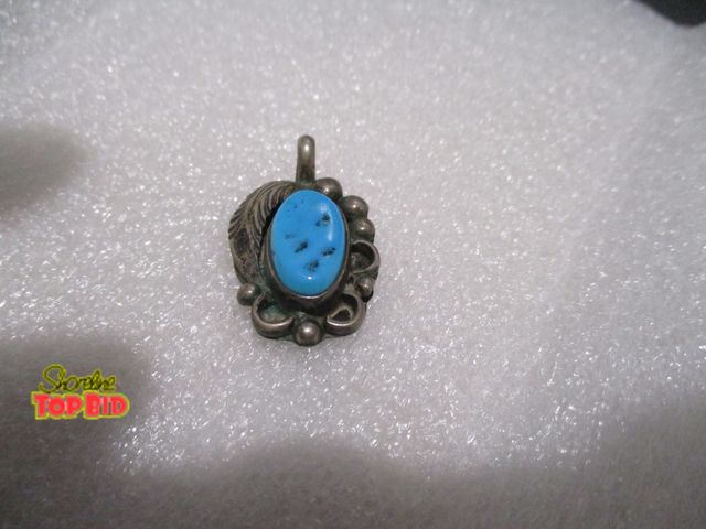 Lot 59-80025 - sterling  Other sterling Indian charm w/horse on back