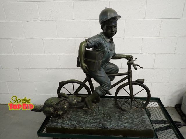 Lot 59-10147 - Signed, by Artist Jim Davidson, Bronze Sculpture titled "Boy Riding Bicycle with Dog" - 41" x 47" x ...