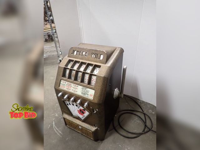 Lot 59-10050 - Original 1957 Daval Jokers Wild Full Scale Trade Stimulator Slot Machine 10 cent Coin Operated. Esti...