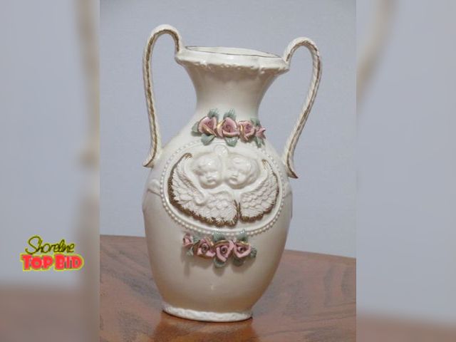 Lot 59-10105 - 10"T cherub eared vase w/pink roses above &amp; below cherubs.  No cracks or defects noted.