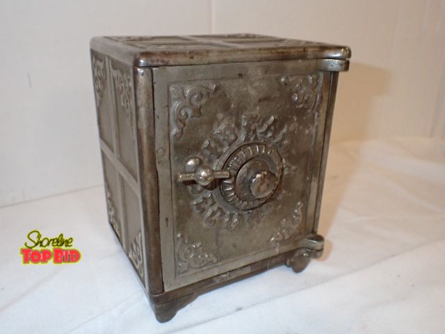 Lot 59-10175 - Antique Cast Iron Ideal Security Combination Lock Coin Still Bank 5 1/2" x 4 1/4" x 3 1/2"