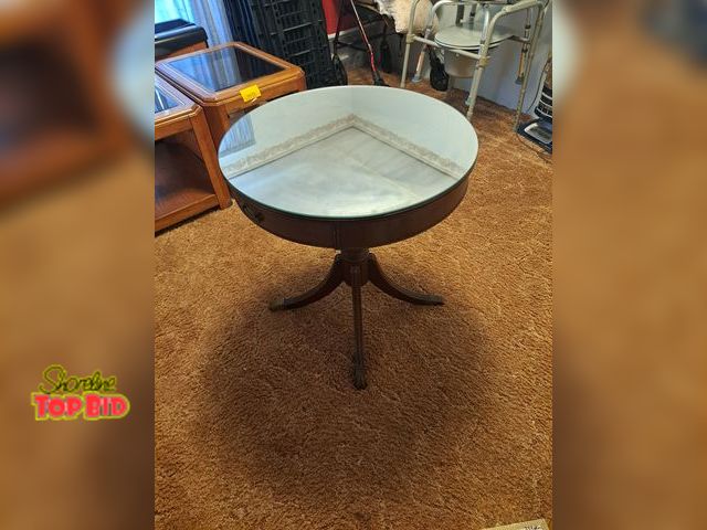 Lot 59-76039 - OFFSITE-Vintage..4 legged .. mirror top ..round table.. 28" tall x 26" wide..in good shape