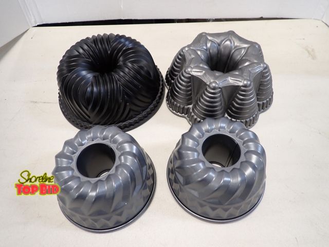 Lot 59-41600 - 4 Bundt Pans