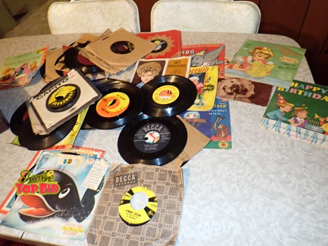 Lot 59-43382 - Vintage 45s includes Disney Sound Tracks