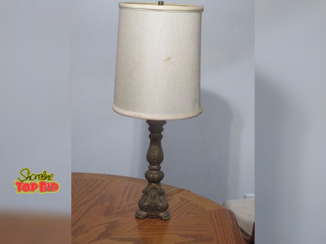 Lot 59-10136 - 26"T composite material lamp with 3 claw feet and human looking designs between the 3 feet.  One cla...