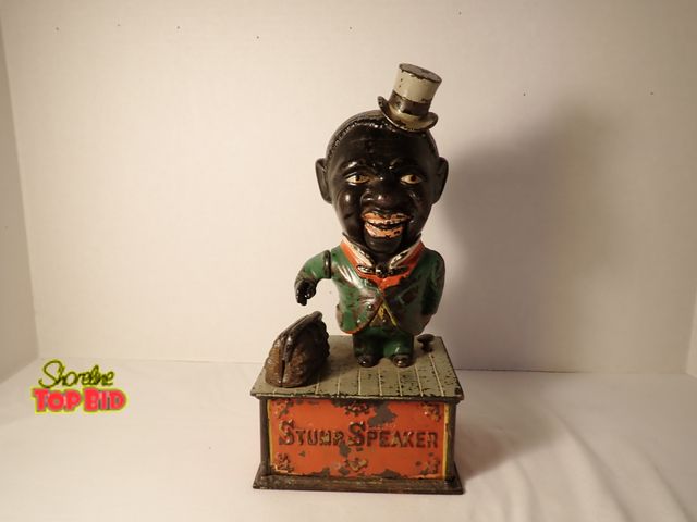 Lot 59-20075 - Genuine 1886 Original Cast Iron "Stump Speaker" Mechanical Bank in working condition, about 9 1/2" t...