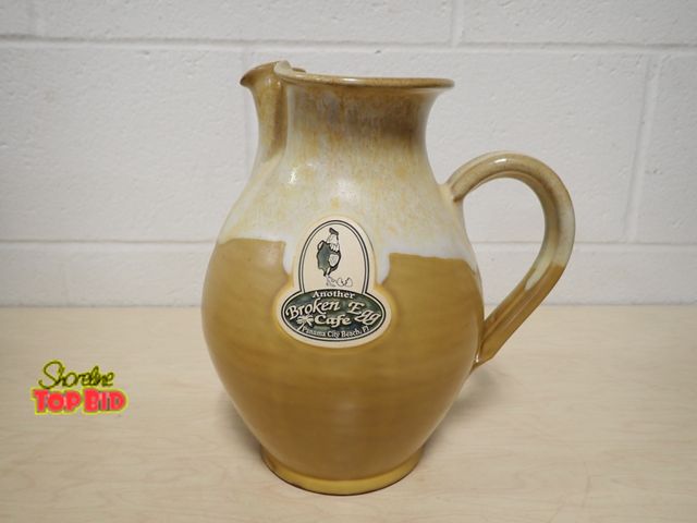 Lot 59-33153 - Collectible Pottery Pitcher, Logo of Another Broken Egg Cafe from Panama City Beach, FL 9" tall