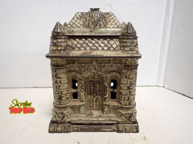 Lot 59-14230 - Antique Cast Iron Figural Still Bank Building by J. E. Stevens Co. around 1893, Intricate Architectu...