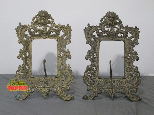 Lot 59-10024 - set of 2 brass Valleau picture frames.  Both frames are 10"W x 16" T, with a picture opening area of...