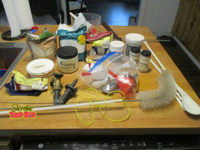 Lot 59-92043 - huge lot of wine making supplies, if you have the jug to put it in everything you need, stirring too...