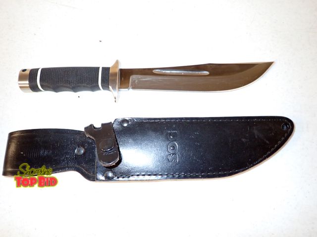 Lot 59-60033 - SOG Fixed Blade Knife Distinctive Clip Point Blade