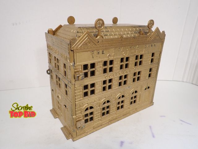 Lot 59-10158 - Awesome Antique 1891 Cast Iron Still Bank Traders Bank of Canada 9" x 10" x 6 3/4" depth