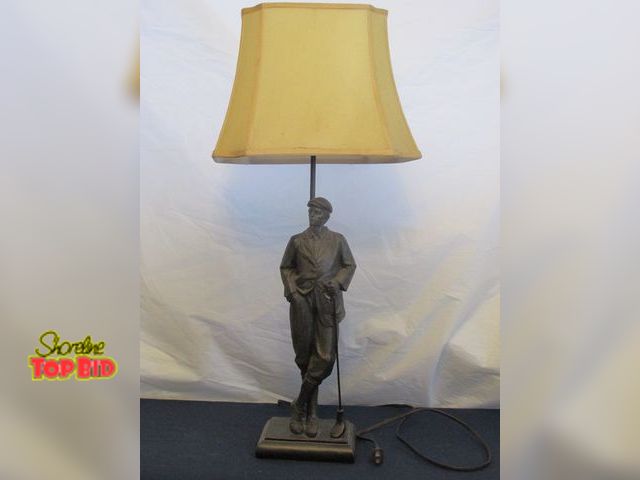 Lot 59-10048 - Golf themed table lamp.  Golfer figure is 18"T, height of entire clock is 31"T, tested and working.