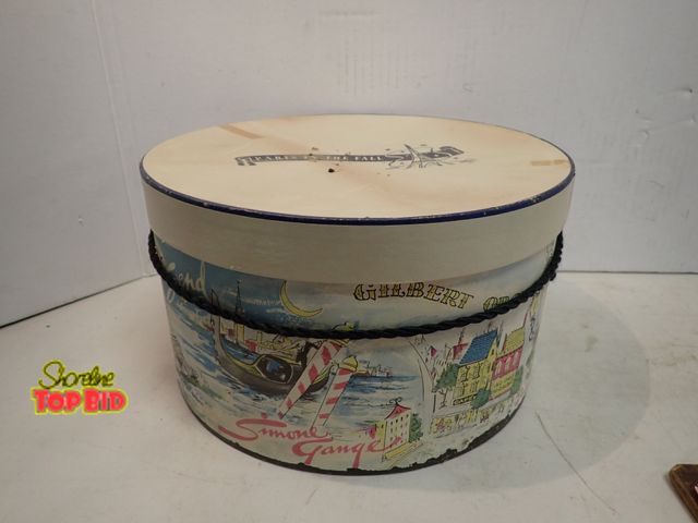 Lot 59-14530 - Mid-Century 1950s Gilbert Orcel Hat Box "Paris in the Fall" 7" x 12" dia