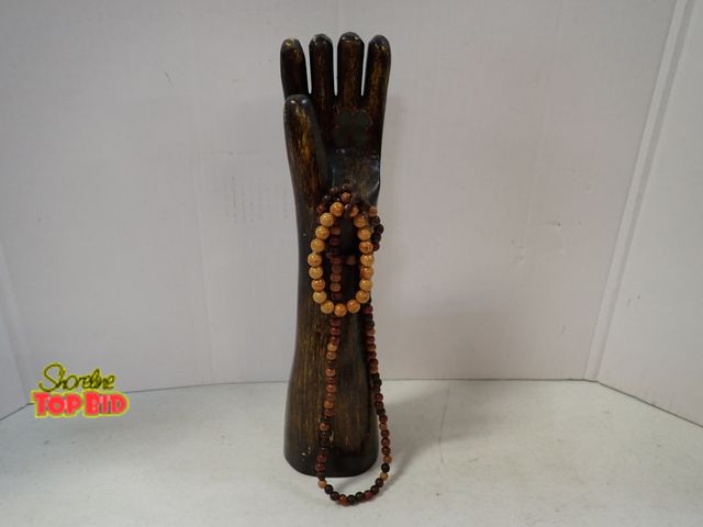 Lot 59-43582 - Buddhist Mudra Hand Sculpture Adorned with Beaded Necklaces