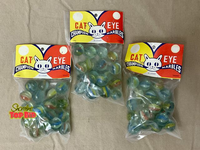 Lot 59-83046 - Vintage Cat Eye champion marbles- 3 unopened bags. NOS