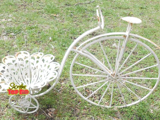 Lot 59-74336 - Vintage wrought iron Bicycle Plant Holder. Great garden accessory. Measures 23" long X 16" high.