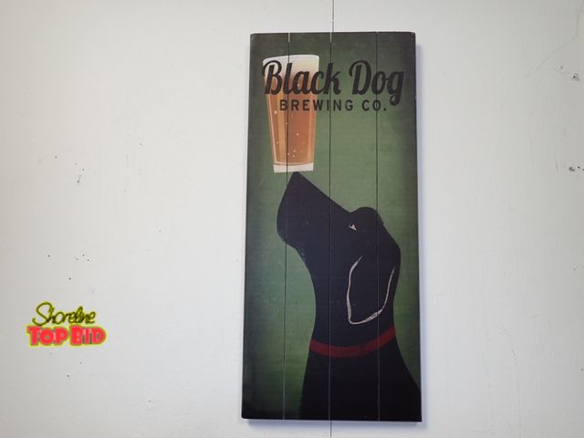 Lot 59-43455 - Wall Art Black Dog Balancing a Beer on its Nose, Black Dog Brewing Co. by Ryan Fowler 32" x 14"