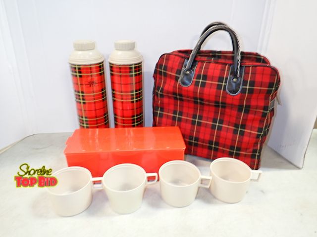 Lot 59-41787 - Twins made in the USA Seeley black-red-tan thermos one dated 1972, one 1973. Also a picnic storage b...