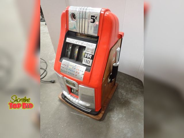 Lot 59-10049 - 1950s Red Mills 7-7-7 High Top 10 cent Mechanical Slot Machine, Works. Estimated value $400.00 to $1...