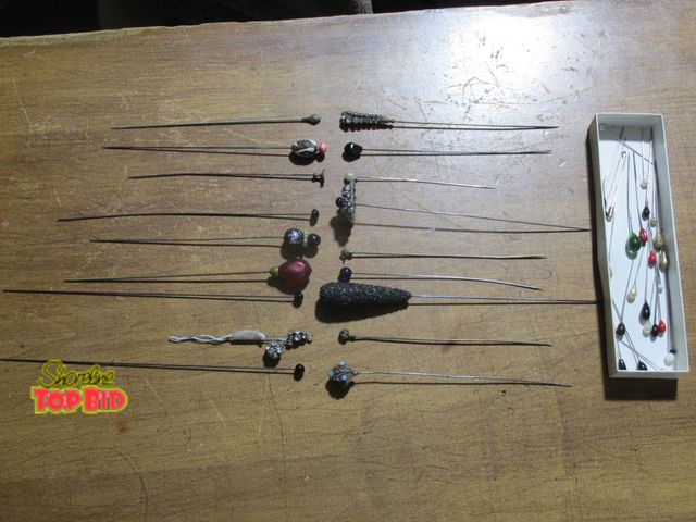 Lot 59-10128 - 18 hatpins, up to 9" long, most are between 6-8 inches long.  Many are decorative and collectible, a...
