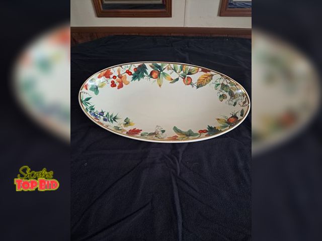 Lot 59-76072 - Ceramic bowl..made in italy..19" x 10" heavy..1 tiny chip
