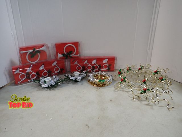 Lot 59-41641 - Napkin holder's and candle holder's 8 gold and 8 white horn dept. 56 napkin holder's with two matchi...