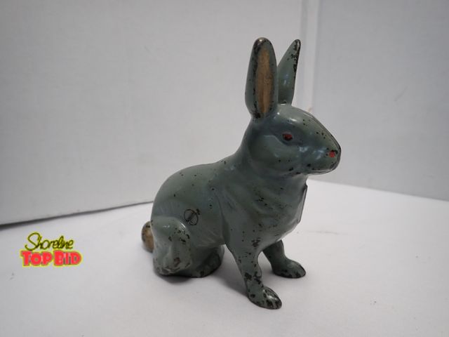 Lot 59-10207 - Original Ca.1900, Cast Iron Still Bank Shaped Like a Seating Rabbit, 6.5 tall x 5.5 long. Estimate v...