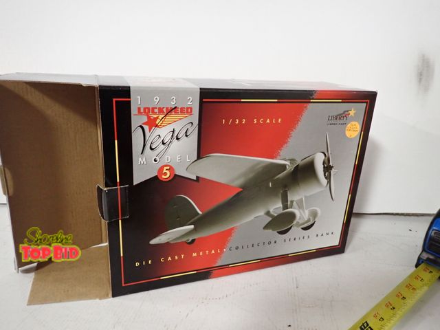 Lot 59-43326 - 1932 Lockheed Vega Model 5 Die-Cast Metal Collector Series Bank Plane, Red, 1/32 Scale, Mint, Never ...