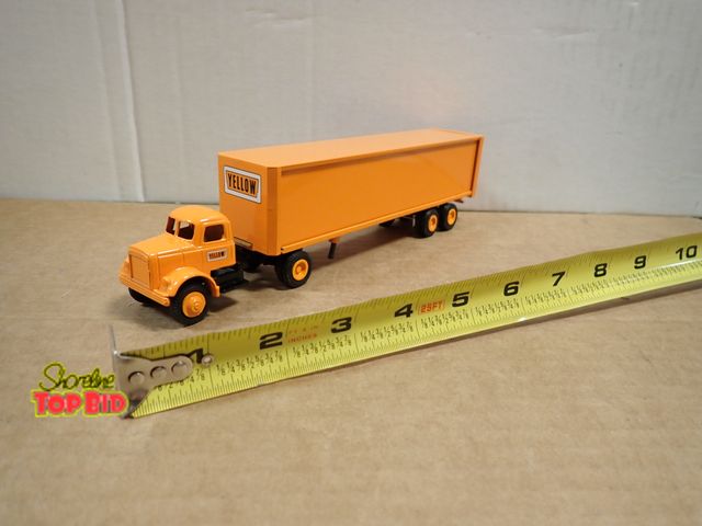 Lot 59-24128 - Winross Yellow Tractor &amp; Trailer, Mint Condition 9" long