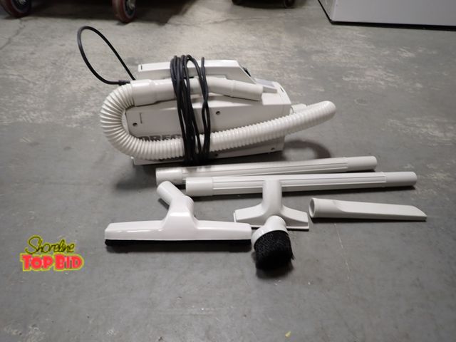 Lot 59-33003 - Oreck Super-Deluxe Compact Canister Vacuum Cleaner with Attachments, Working