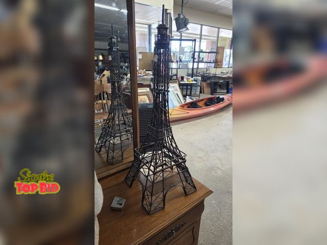 Lot 59-95013 - OFFSITE  Metal Eiffel Tower replica  34.5 in tall  12 in wide  11.5 in depth