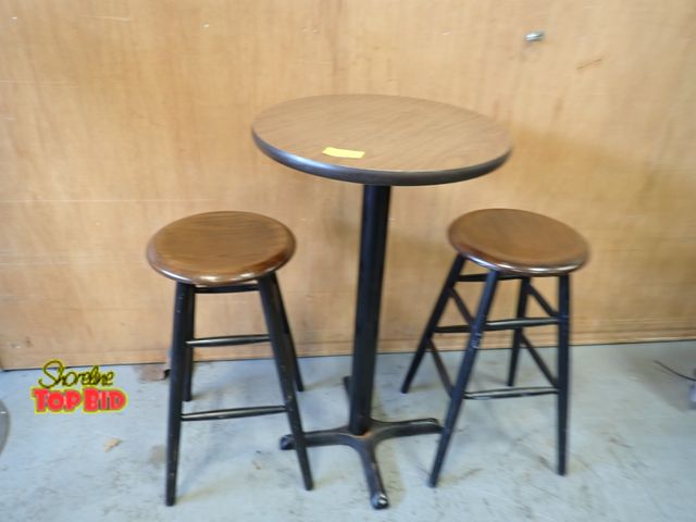 Lot 59-30178 - Pub Table with 2 Wooden Stools - Table has heavy metal 4 footed base - very sturdy - measures 24" di...
