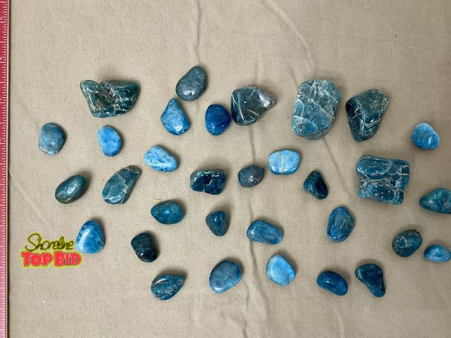 Lot 59-83048 - Nice selection of polished blue apatite rocks.