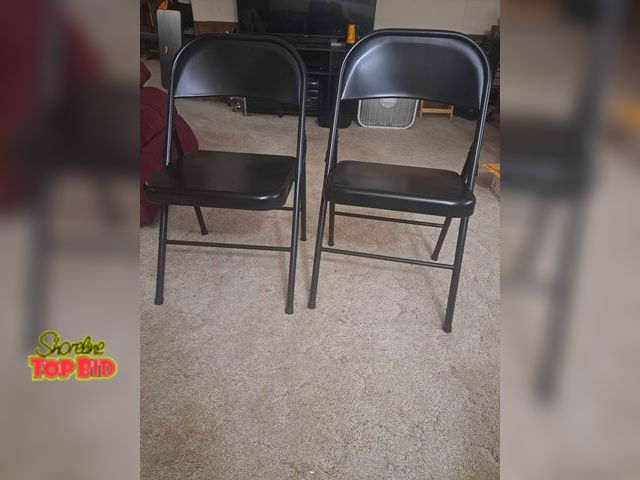 Lot 59-76057 - 2 black metal folding chairs..like new