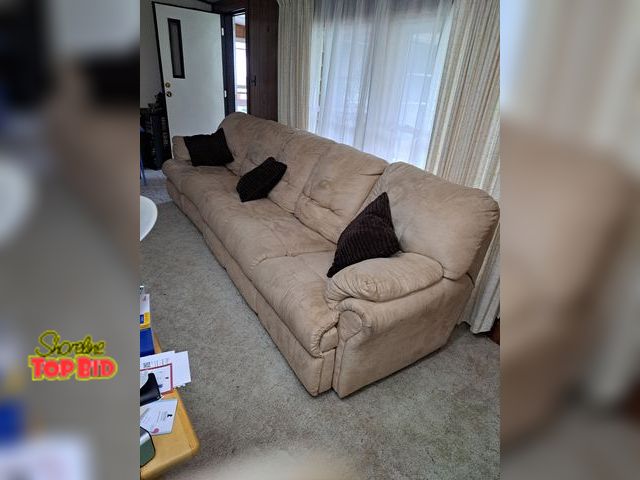 Lot 59-76068 - OFF SITE (Muskegon Area) 11' x 3'4" light tan couch..both ends recline.. can separate..good conditio...
