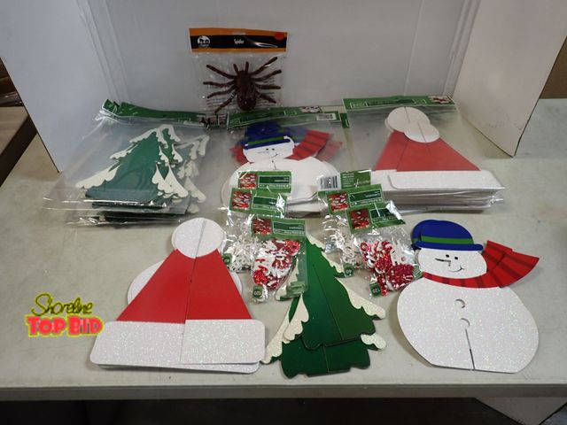 Lot 59-41568 - Holiday Decor: 7 Trees, 4 Snowmen, 7 Hats, 4 Snow Packs of Scatterables, 2 Packs of Ho Ho Scatterabl...